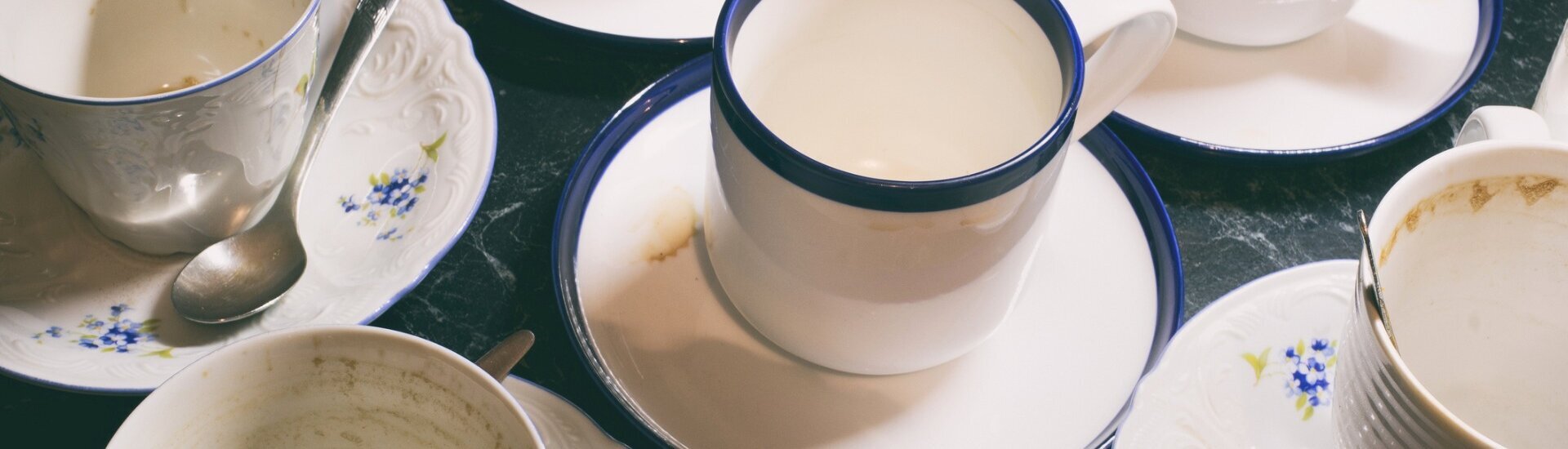 Dirty coffee and tea dishes