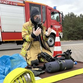 Remove firefighting gloves, put on disposable gloves