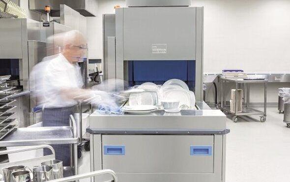 unloading the commercial dishwasher