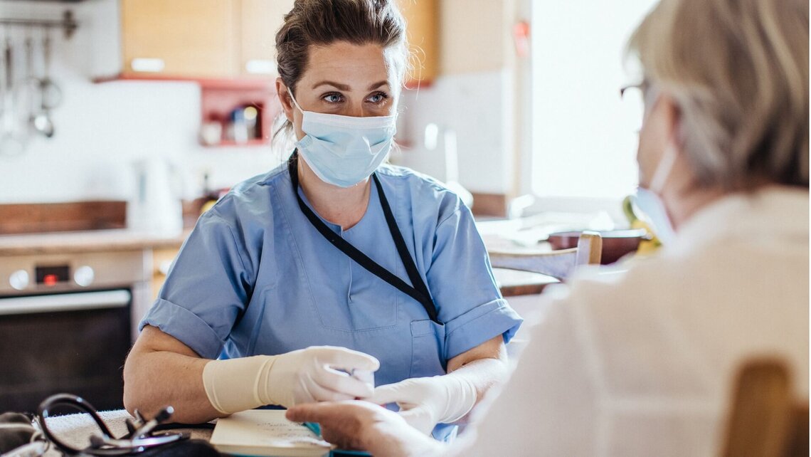 A doctor wearing a mask for protection against pathogens in the air